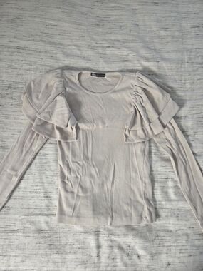 Zara Soft Cream Long-Sleeve Top with Layered Ruffle Shoulders